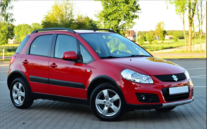 Suzuki SX4 cena 31900 przebieg: 93865, rok produkcji 2013 z Piastów małe 562